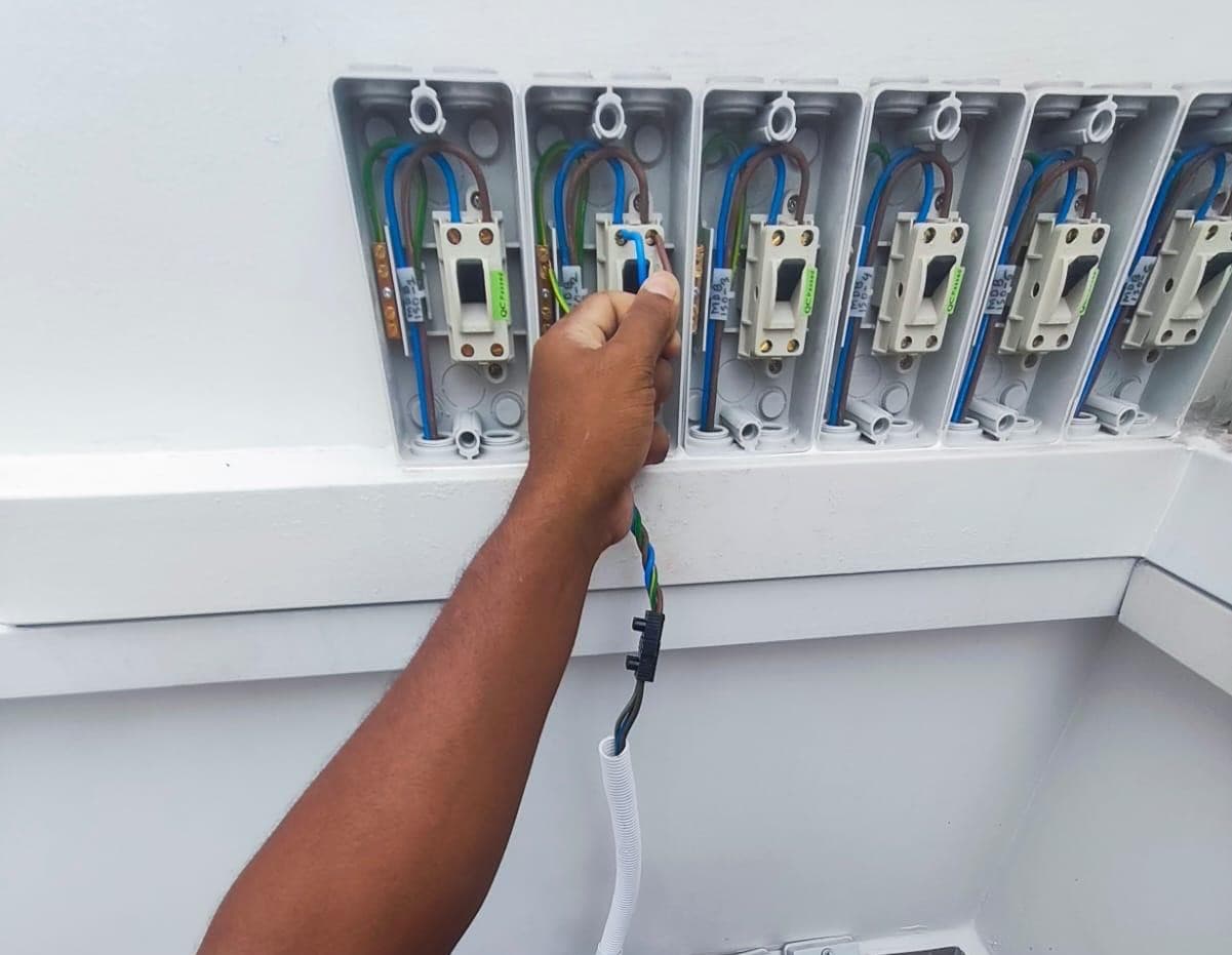 Kok Yee Engineering technician completing a renovation job in Singapore